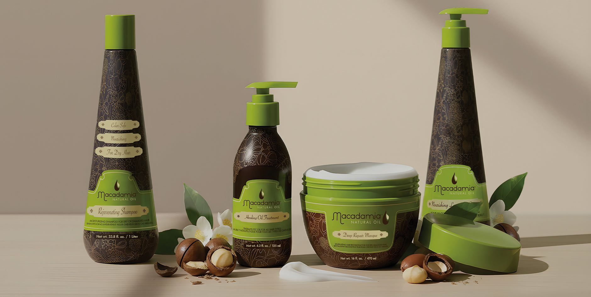Macadamia hair care products including bottles and a jar on a neutral background