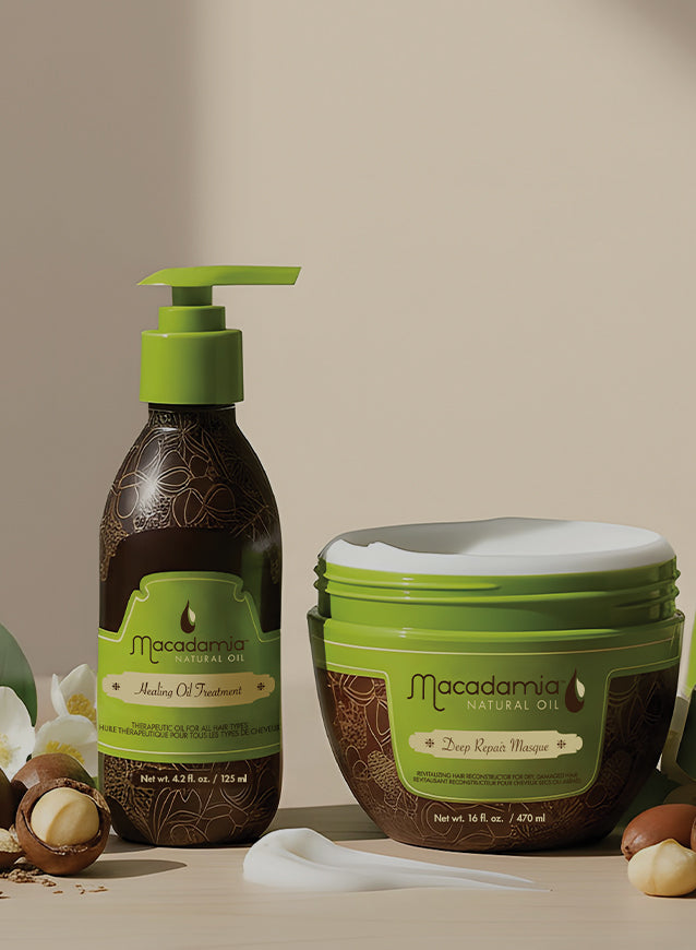 Macadamia hair care products including a bottle and a jar on a neutral background